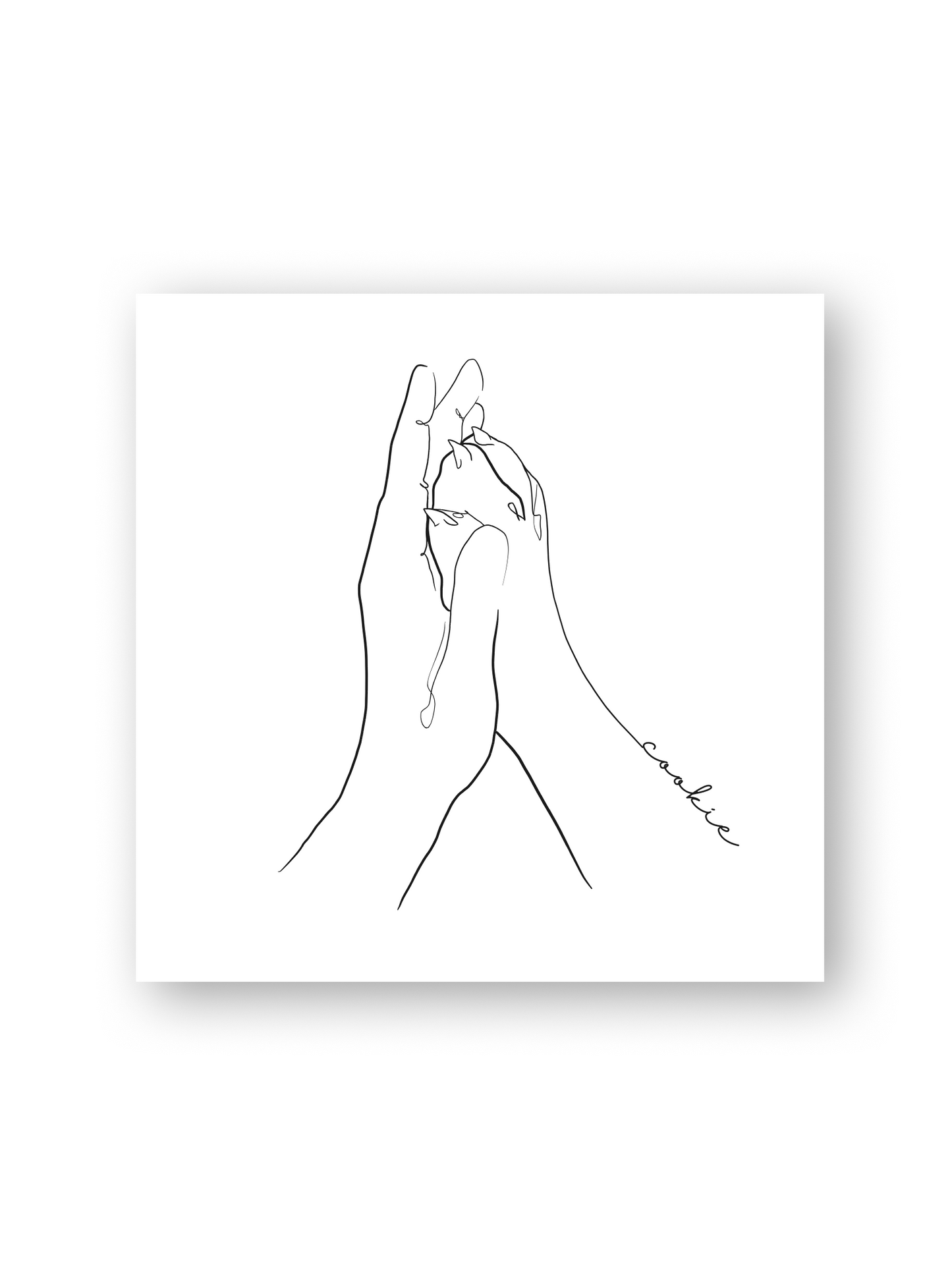 „Patita“ von Sels Studio – Line Art einer aufgerichteten Hundepfote in einer Hand auf weißem Hintergrund, personalisierbares Erinnerungsbild mit Name